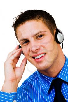 Royalty Free Photo of a Businessman Wearing Headphones