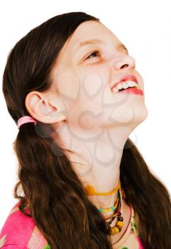 Royalty Free Photo of a Girl Smiling and Looking up