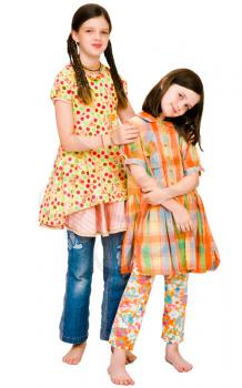 Royalty Free Photo of Two Barefoot Girls Standing Together