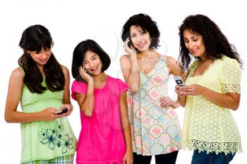 Close-up of a family using mobile phones isolated over white