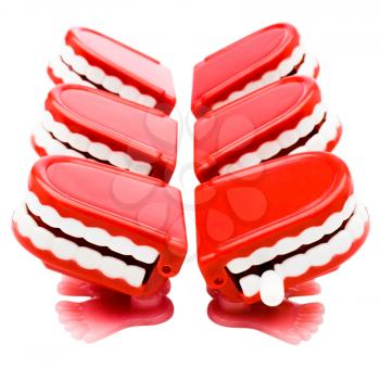 Close-up of set of dentures isolated over white