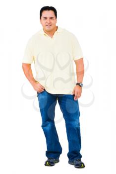 Happy man standing with his hands in his pockets isolated over white
