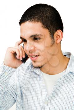 Man talking on a mobile phone isolated over white