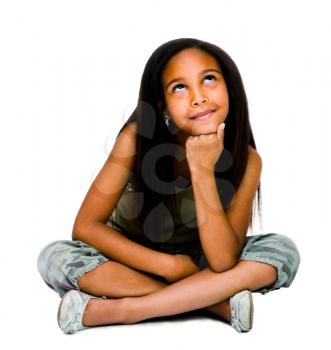 Close-up of a girl day dreaming and smiling isolated over white