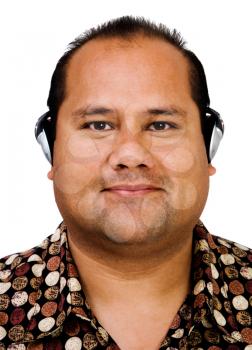 Close-up of a man listening to music on a headphones isolated over white