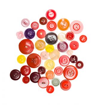 Heap of colorful buttons isolated over white