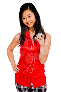 Happy woman listening to music on a MP3 player isolated over white