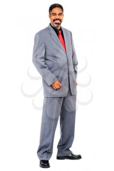 Mature businessman posing and smiling isolated over white