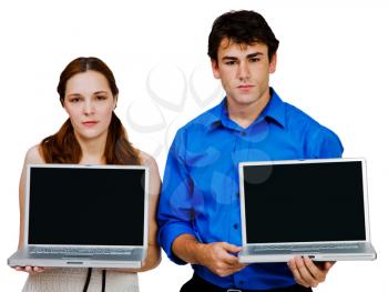 Girlfriend and boyfriend showing laptops isolated over white