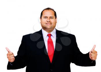 Mid adult businessman showing thumbs up and smiling isolated over white