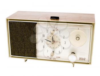 Old alarm clock isolated over white