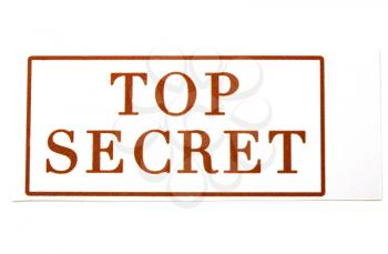 Top secret text written on a sheet of paper isolated over white