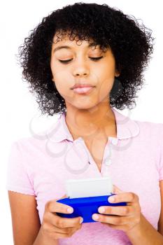 Caucasian teenage girl text messaging isolated over white