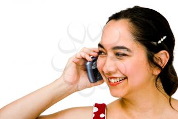 Smiling woman talking on a mobile phone isolated over white