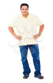 Portrait of a man standing with arms akimbo isolated over white