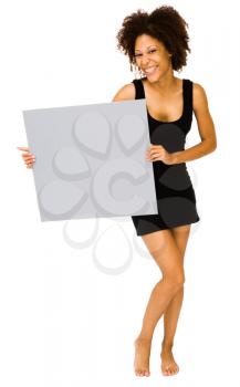 Young woman showing a placard isolated over white