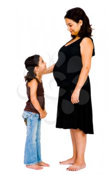 Mother smiling with her daughter and posing isolated over white