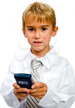 Happy boy text messaging on a mobile phone isolated over white