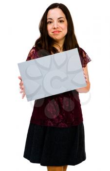 Smiling woman showing an empty placard isolated over white