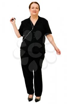 Portrait of a woman listening to music on MP3 player isolated over white