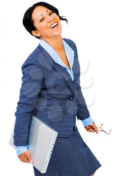 Close-up of a businesswoman holding a laptop and smiling isolated over white