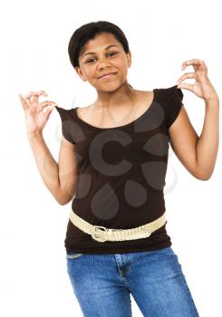 Close-up of a girl posing and smiling isolated over white