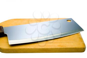Sharp meat cleaver with a cutting board isolated over white