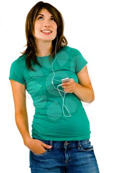 Latin American woman listening to music on a MP3 player isolated over white