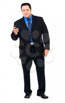 Businessman using a mobile phone isolated over white