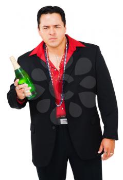 Latin American man holding a champagne bottle isolated over white