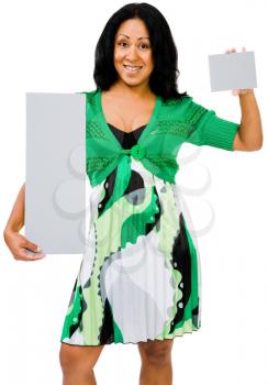 Mixedrace woman showing placards and posing isolated over white