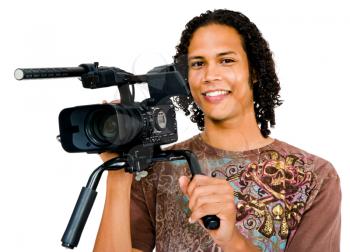 Close-up of a man photographing with a camera and smiling isolated over white