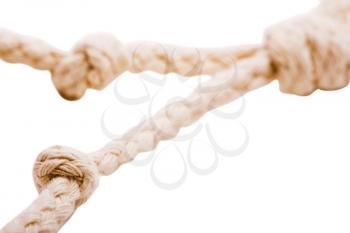 Tied knot of a rope isolated over white
