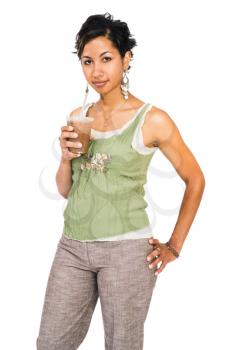Mixed race woman drinking chocolate shake and smiling isolated over white