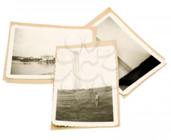 Three old photographs isolated over white