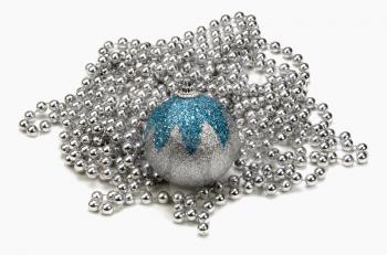 Silver and blue bauble on string of silver beads