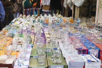 Glassware for sale at a market stall, New Delhi, India