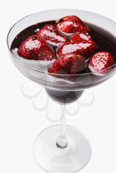 Strawberries dipped in chocolate syrup