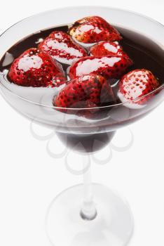 Strawberries dipped in chocolate syrup