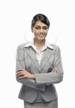 Portrait of a businesswoman standing against a white background