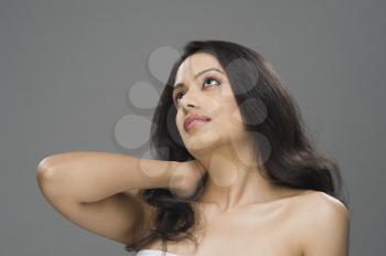 Close-up of a young woman thinking