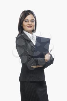 Portrait of a businesswoman holding a file