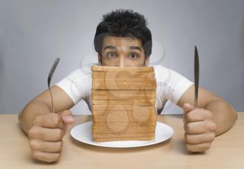 Man staring at the slices of bread