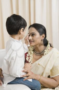 Woman loving with her son at home