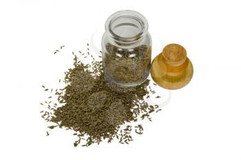 Cumin seed spilling out from a container