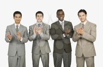 Businessmen applauding