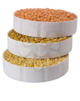 Close-up of a stack of assorted beans in containers
