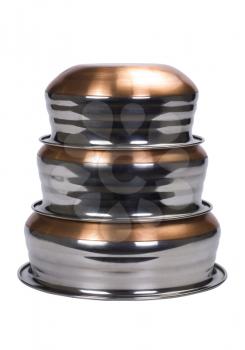 Close-up of a stack of stainless steel cooking pots