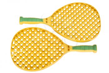 Close-up of a pair of toy tennis rackets