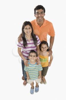 Portrait of parents with their children smiling